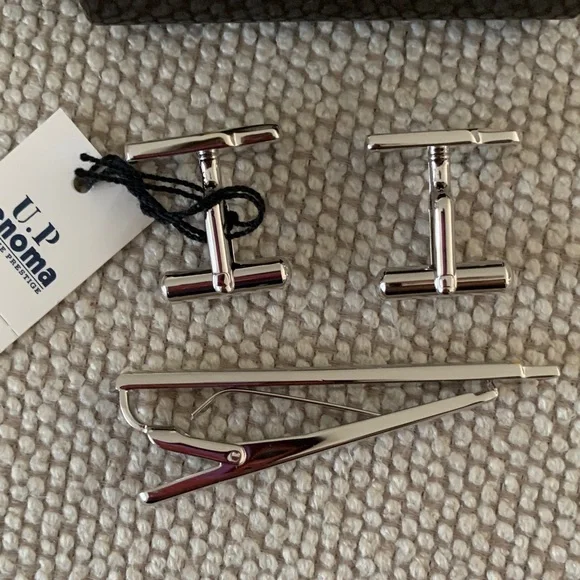 U.P. RENOMA Silvertone Cufflinks and Tie Clip Set